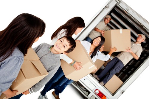 House removals team handling a home move in Enfield