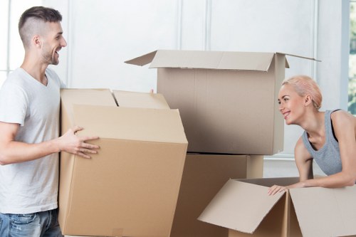 Organised boxes and packing materials ready for an Enfield move