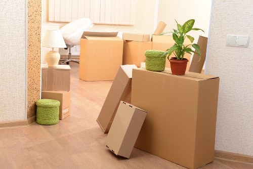 Professional movers handling access challenges on an Enfield street